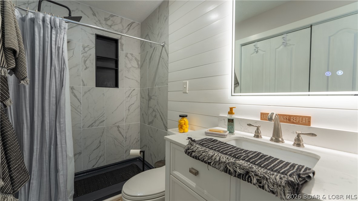109 Red Cedar Road Sunrise Beach, MO 65079 - Photo 9 of 31 Main Bathroom New- Tile Shower, Flooring, Vanity