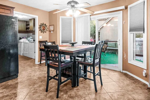 a dining room well furnished