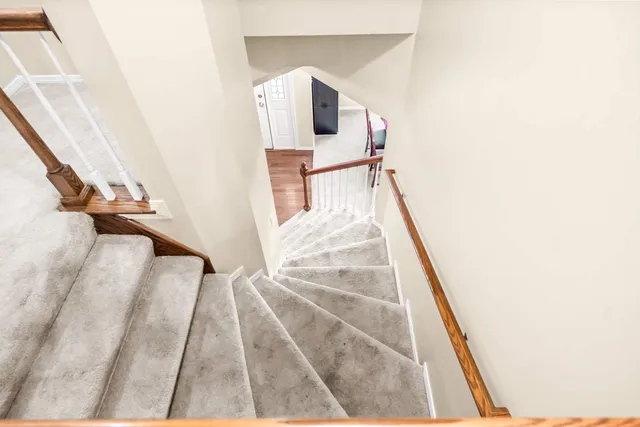 a view of living room with furniture and rug
