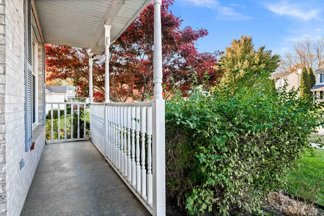 a view of a pathway of a house with wooden floor