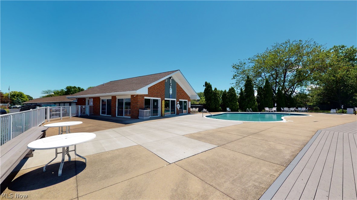 1909 East Harbor Road, Unit 201E Port Clinton, OH 43452 - Photo 7 of 20 Clubhouse and pool