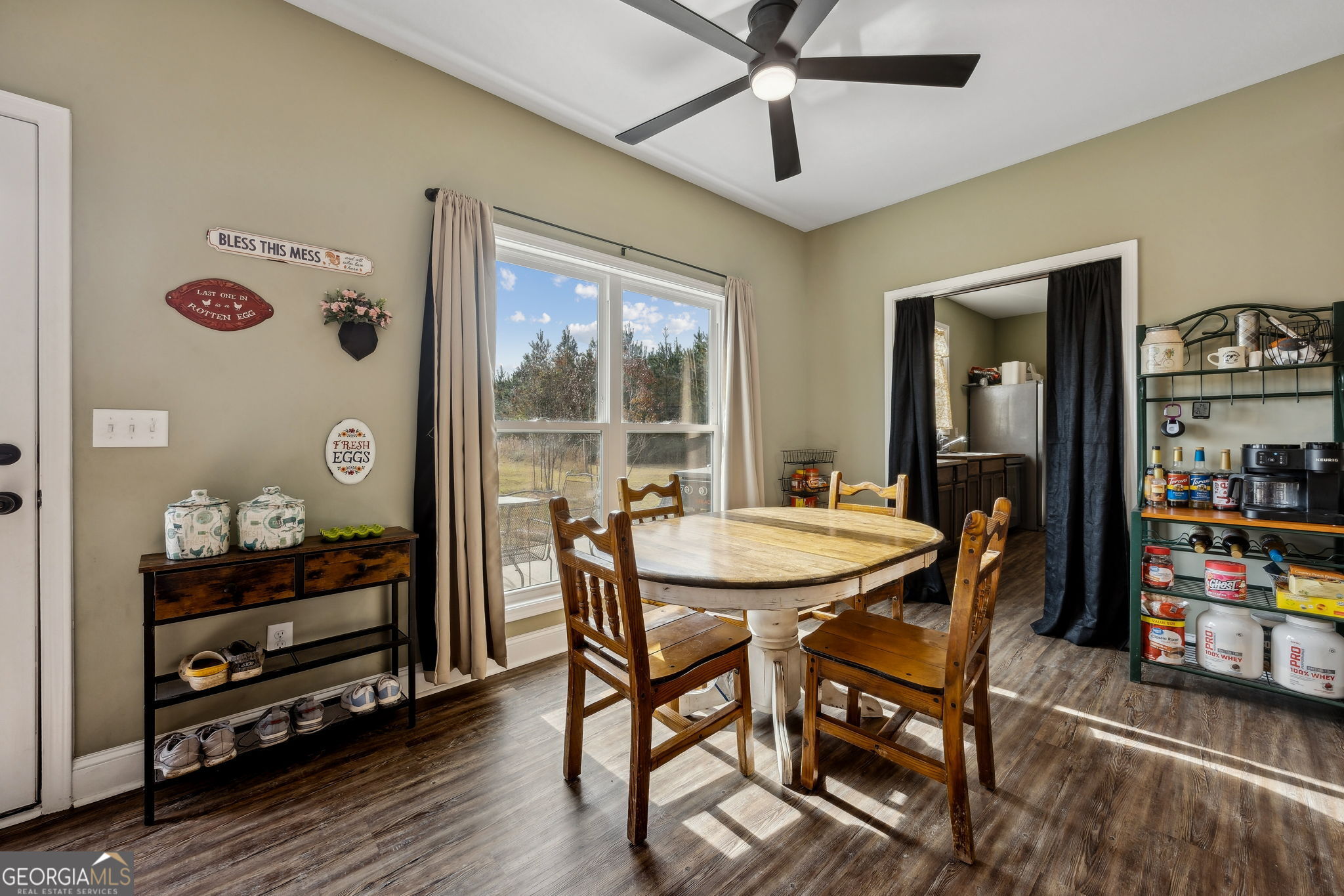 691 Oak Well Road Kingsland, GA 31548 - Photo 25 of 82 a dining room with furniture and window