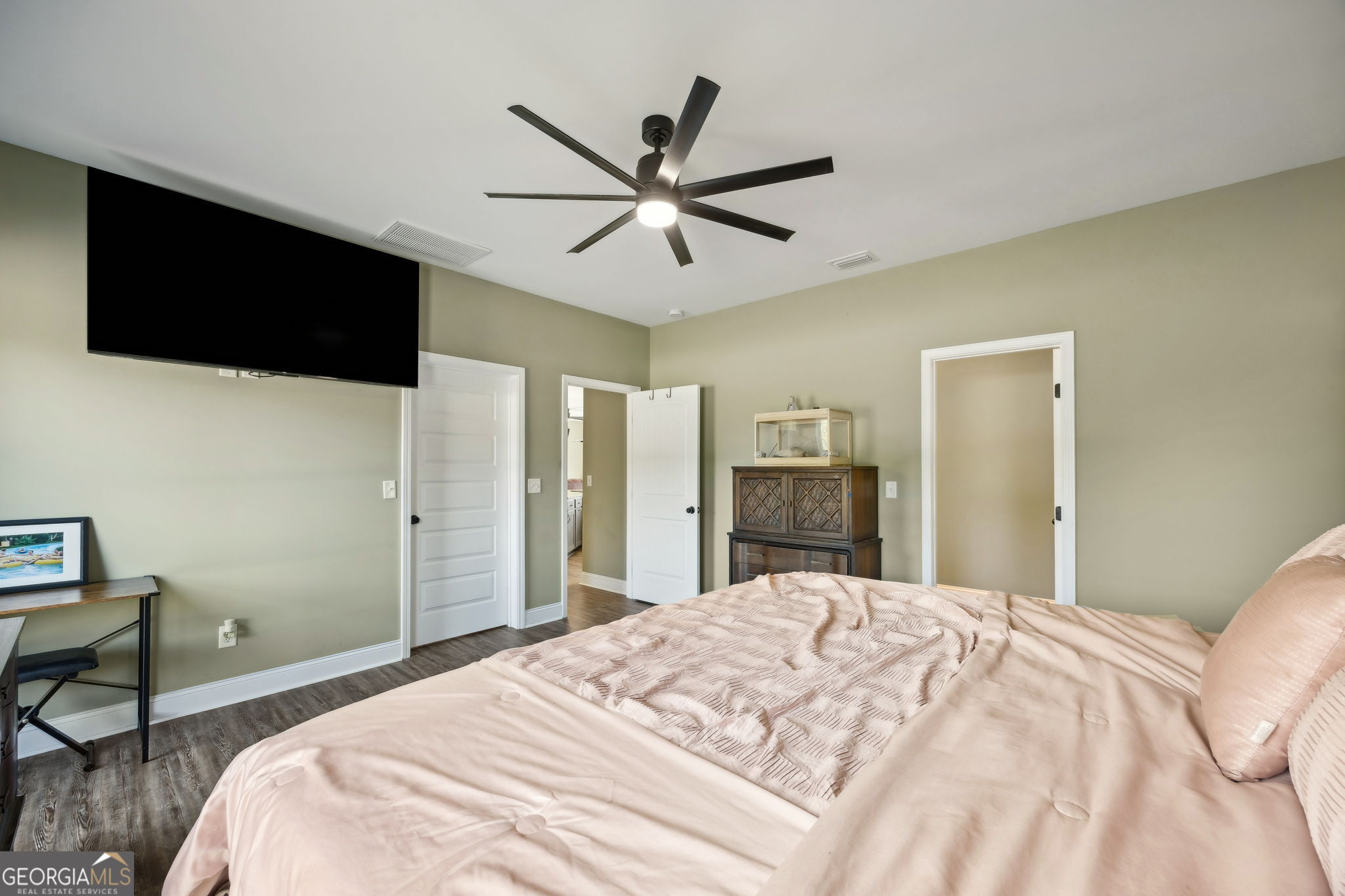 691 Oak Well Road Kingsland, GA 31548 - Photo 32 of 82 a bedroom with a bed and a flat screen tv