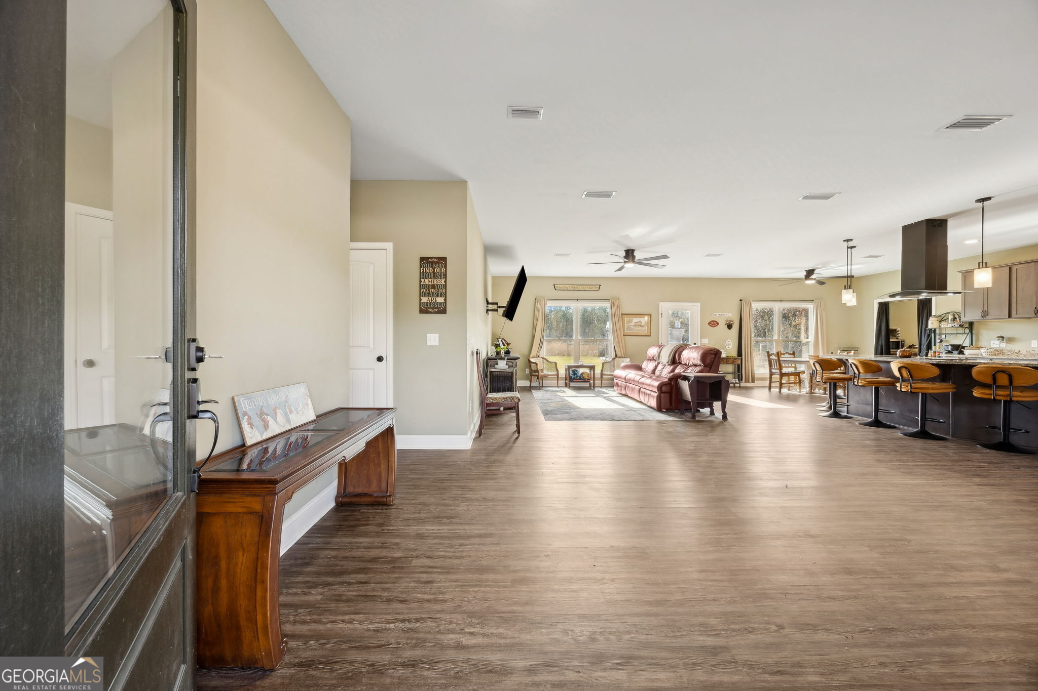 691 Oak Well Road Kingsland, GA 31548 - Photo 4 of 82 a living room with furniture and a table