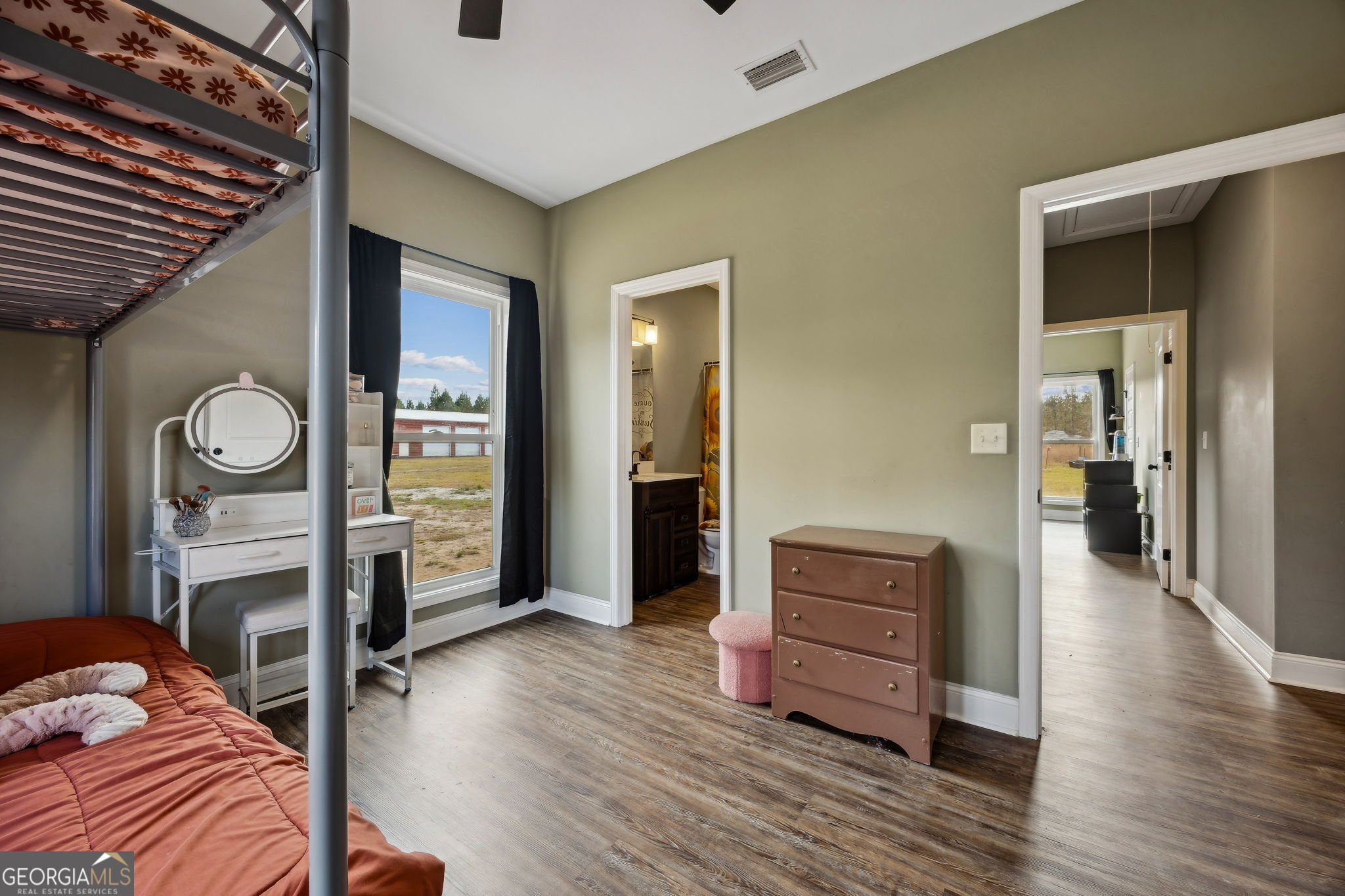 691 Oak Well Road Kingsland, GA 31548 - Photo 45 of 82 a view of a bedroom and wooden floor