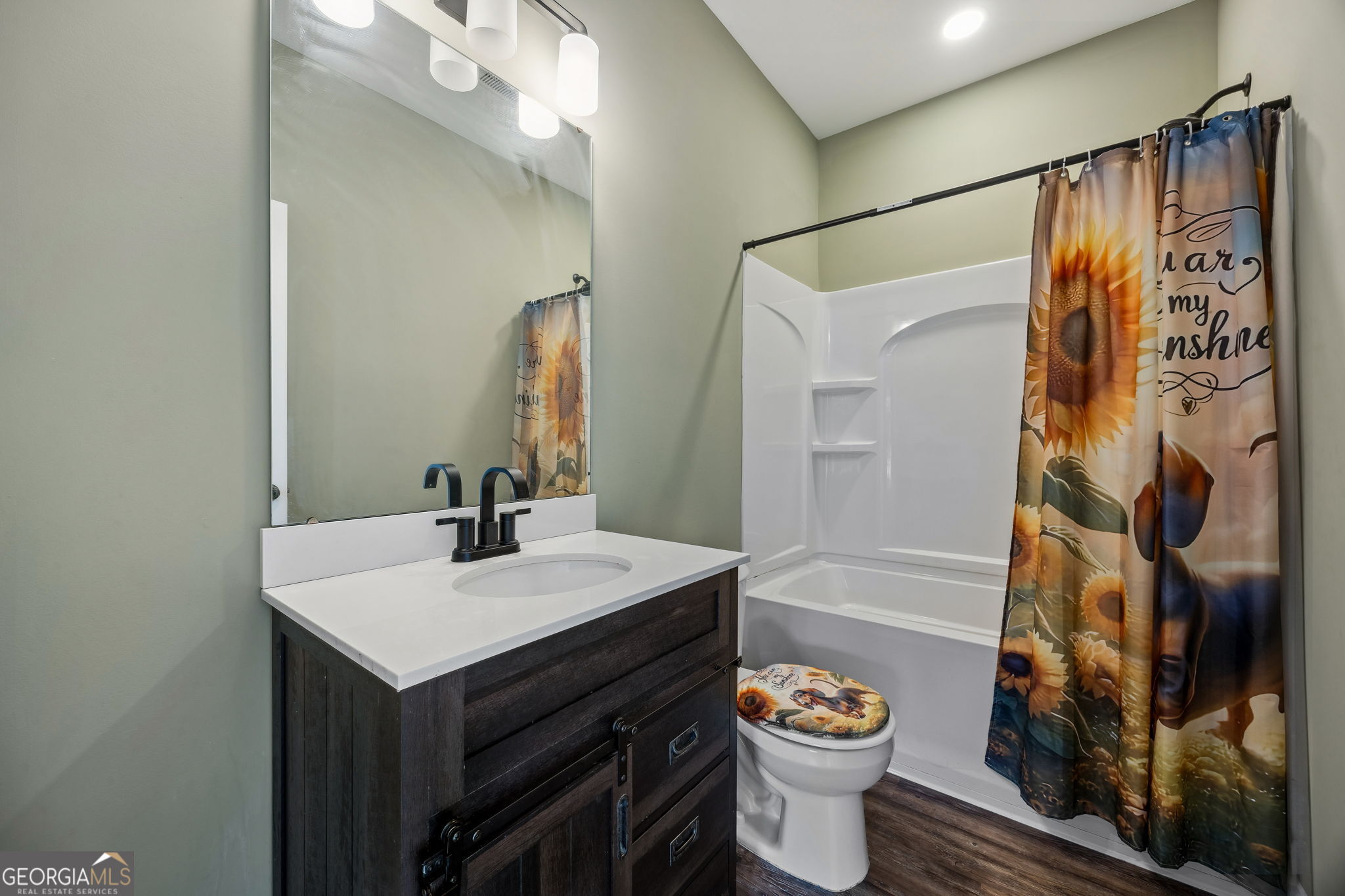 691 Oak Well Road Kingsland, GA 31548 - Photo 46 of 82 a bathroom with a sink a toilet and shower