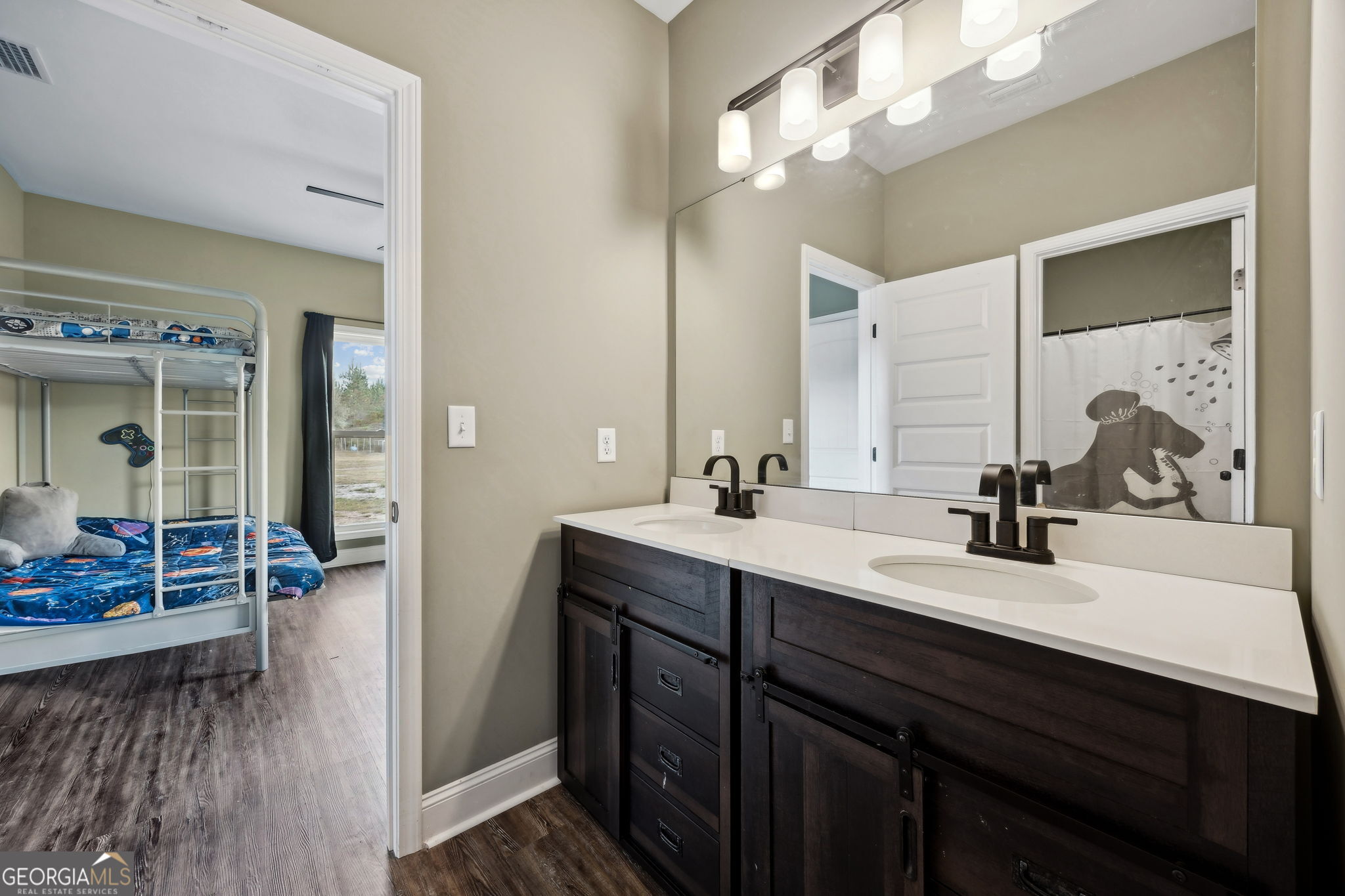 691 Oak Well Road Kingsland, GA 31548 - Photo 53 of 82 a bathroom with a sink double vanity and a mirror