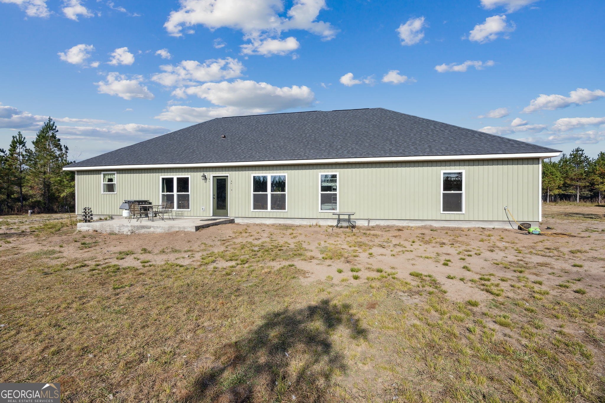 691 Oak Well Road Kingsland, GA 31548 - Photo 63 of 82 a backyard of a house with large trees