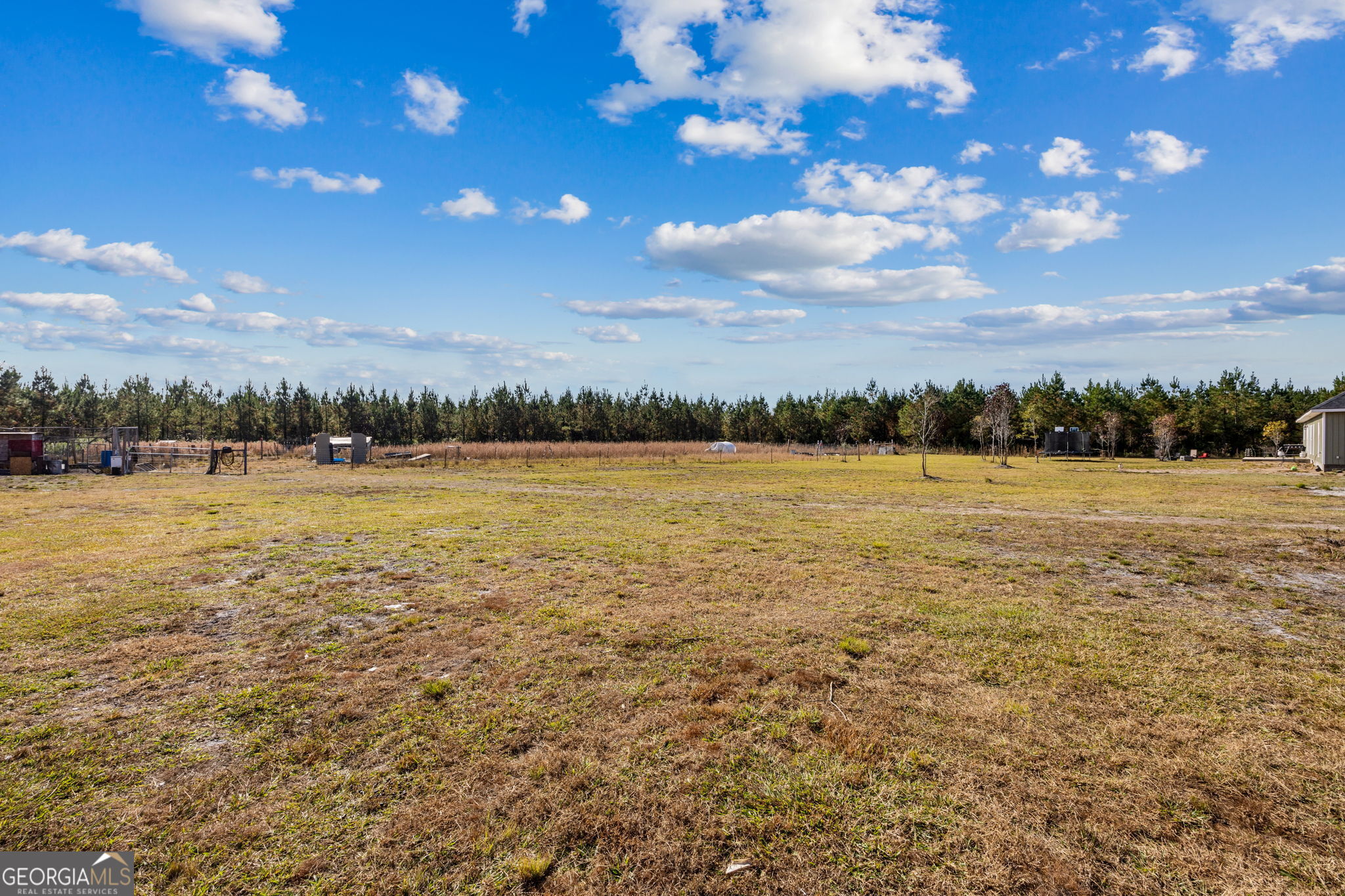 691 Oak Well Road Kingsland, GA 31548 - Photo 67 of 82 a view of an ocean beach and a yard