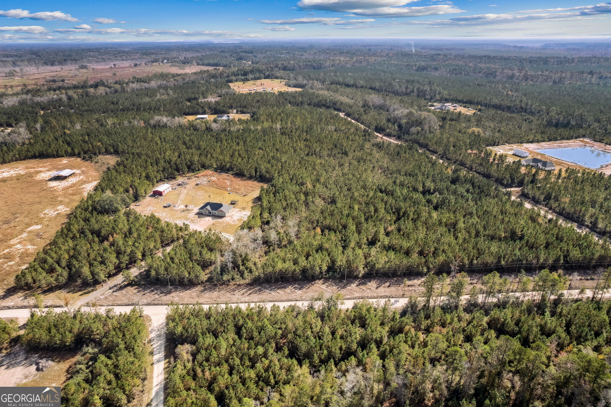 691 Oak Well Road Kingsland, GA 31548 - Photo 76 of 82 a view of a lake with a city