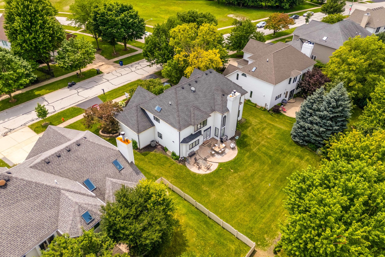 2627 Rutland Road Naperville, IL 60564 - Photo 2 of 38 an aerial view of a house with a swimming pool and garden