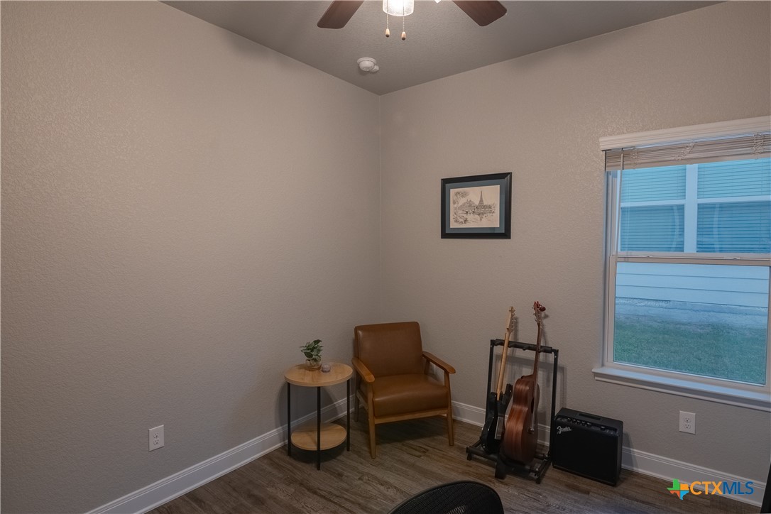 7909 McCulloch Road Temple, TX 76502 - Photo 27 of 46 a view of a workspace with furniture and a window