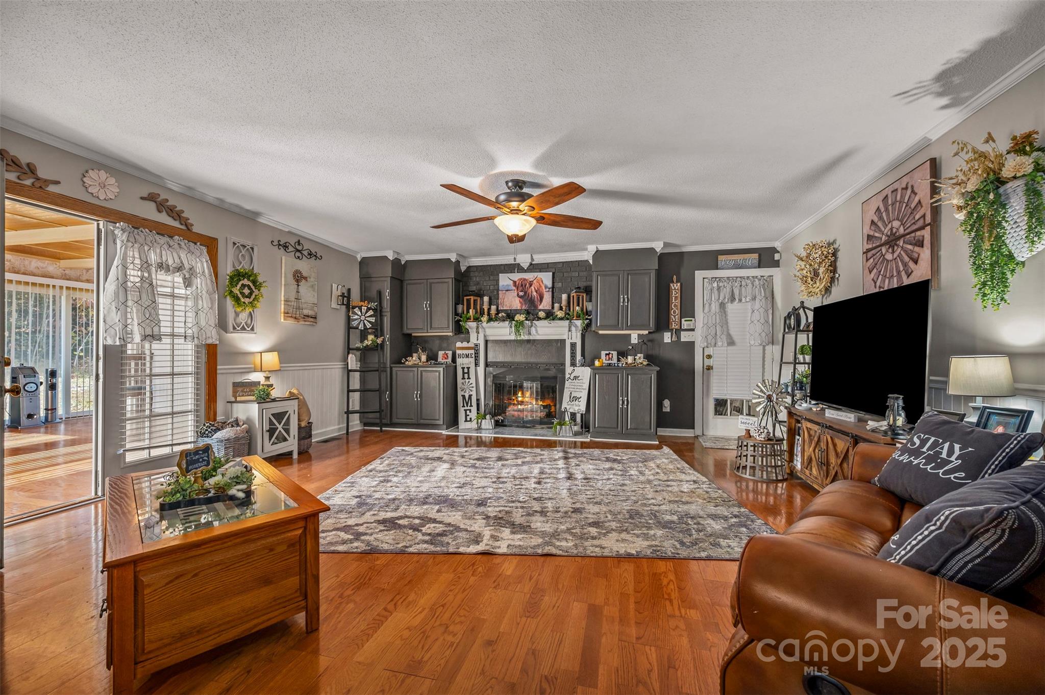 334 Bridge Road Ellenboro, NC 28040 - Photo 14 of 48 a living room with fireplace furniture and a flat screen tv