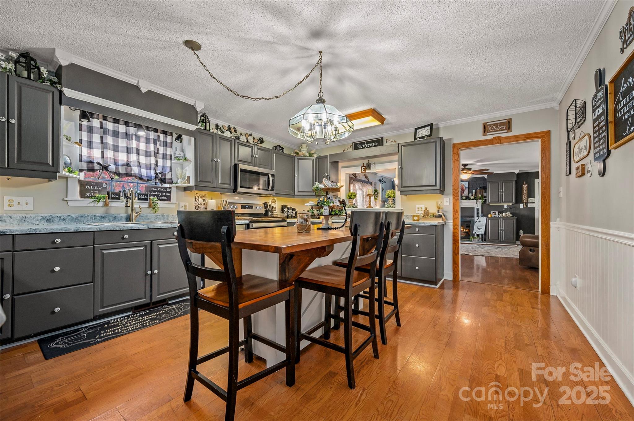334 Bridge Road Ellenboro, NC 28040 - Photo 21 of 48 a view of a dining room with furniture