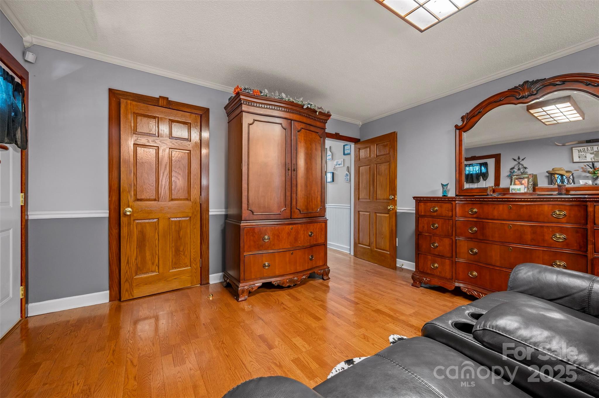 334 Bridge Road Ellenboro, NC 28040 - Photo 24 of 48 a living room with furniture and wooden floor