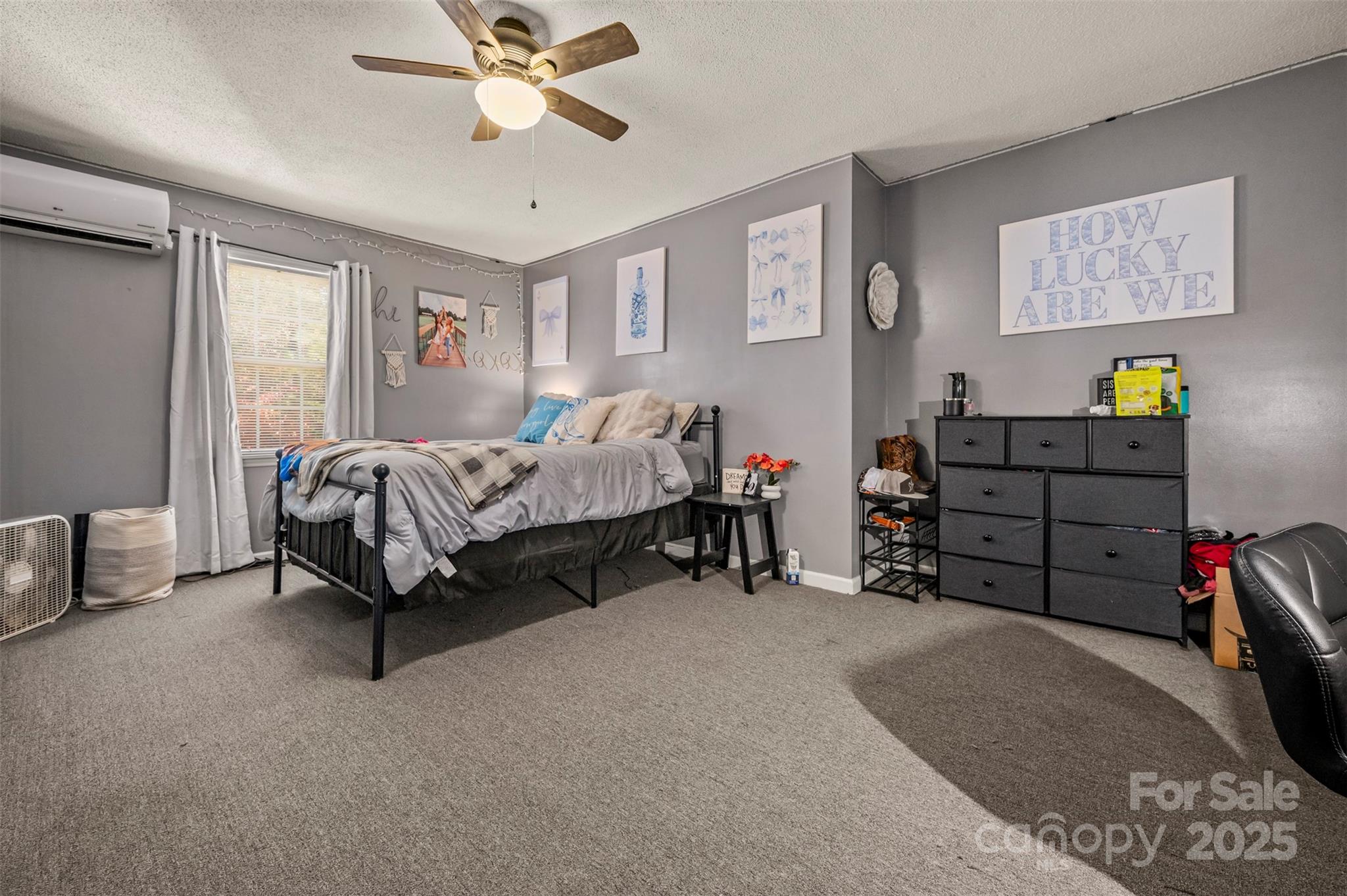 334 Bridge Road Ellenboro, NC 28040 - Photo 34 of 48 a bed room with a bed and a ceiling fan