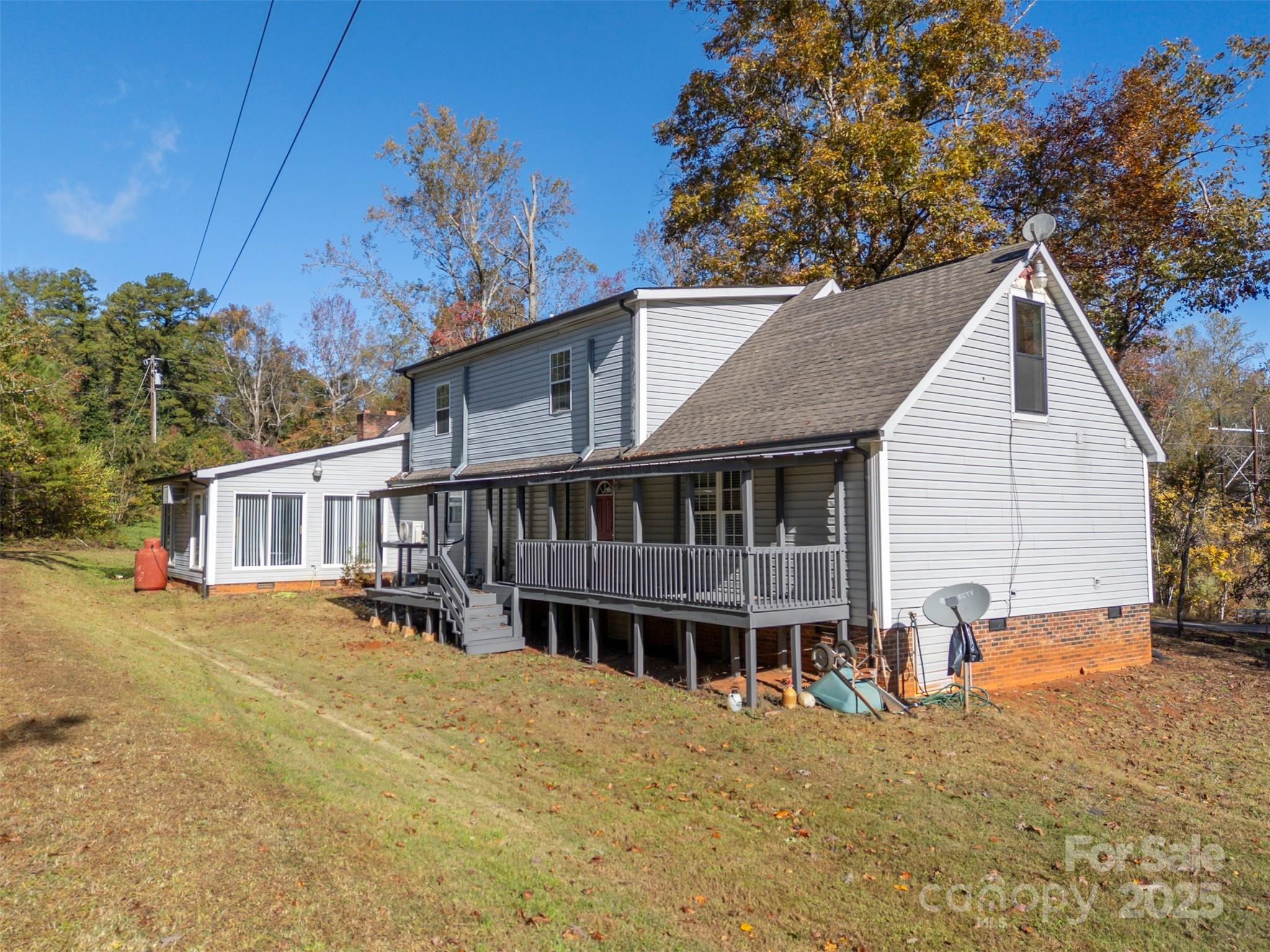 334 Bridge Road Ellenboro, NC 28040 - Photo 36 of 48 a view of a house with a patio