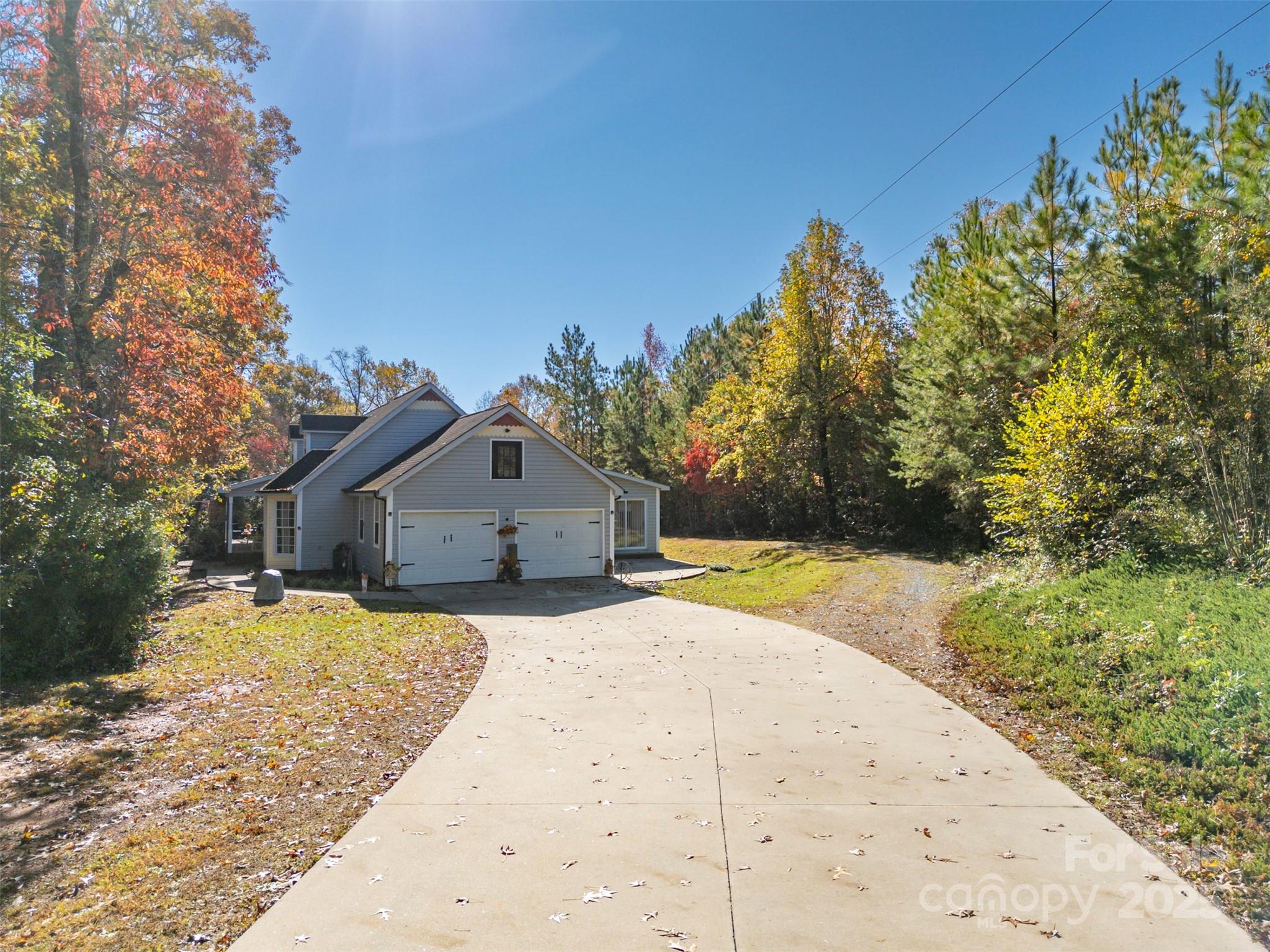 334 Bridge Road Ellenboro, NC 28040 - Photo 40 of 48 a view of a house with a yard covered with snow in front of house