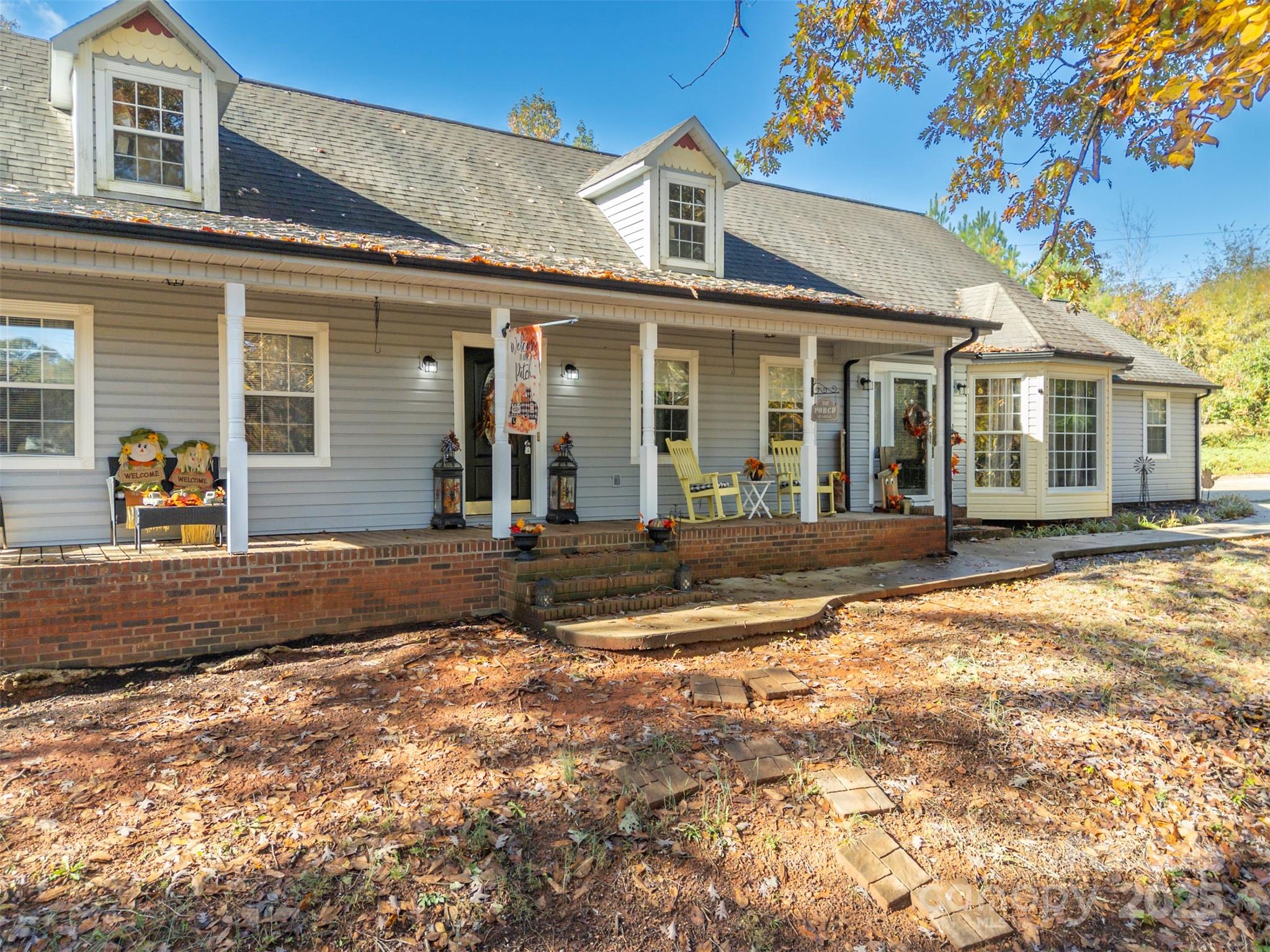 334 Bridge Road Ellenboro, NC 28040 - Photo 4 of 48 front view of a house with a patio