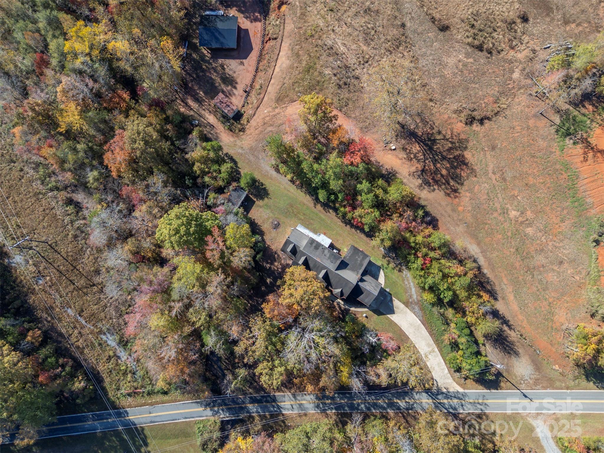 334 Bridge Road Ellenboro, NC 28040 - Photo 47 of 48 a view of a city with flower plants