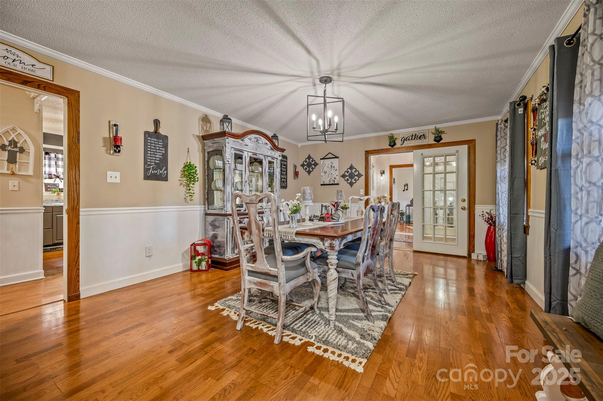 334 Bridge Road Ellenboro, NC 28040 - Photo 10 of 48 a view of a dining room with furniture window and wooden floor