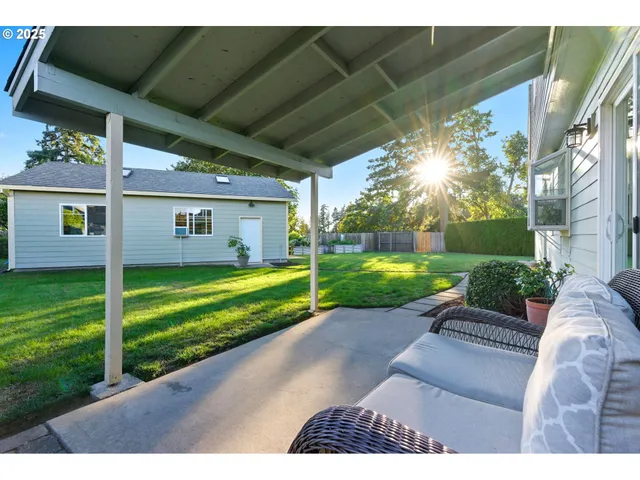 a view of a porch with a garden