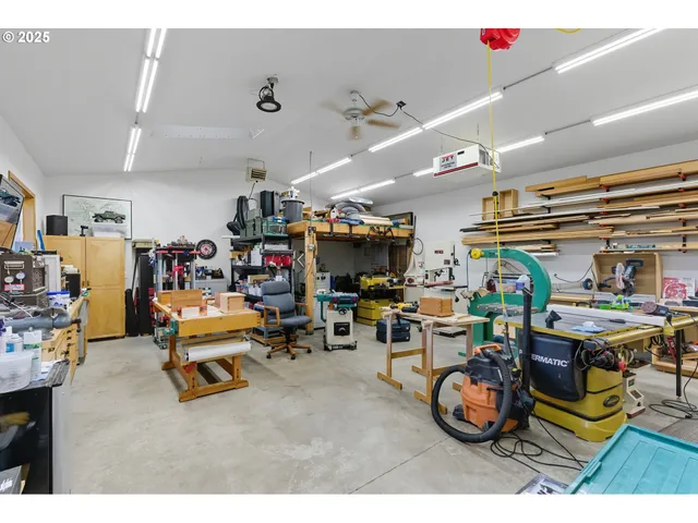 a living room with lots of furniture and a flat screen tv