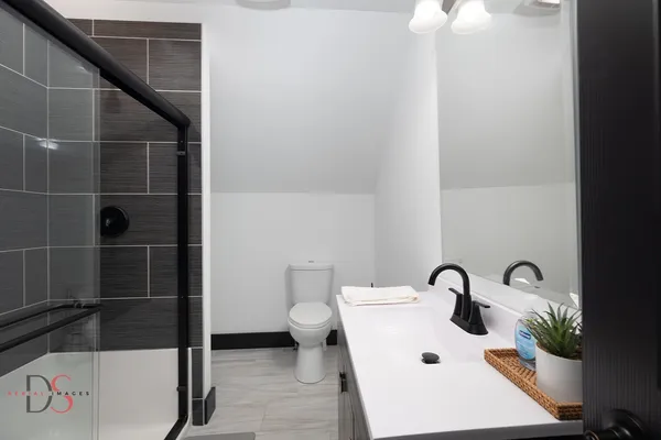 a bathroom with a sink and a toilet