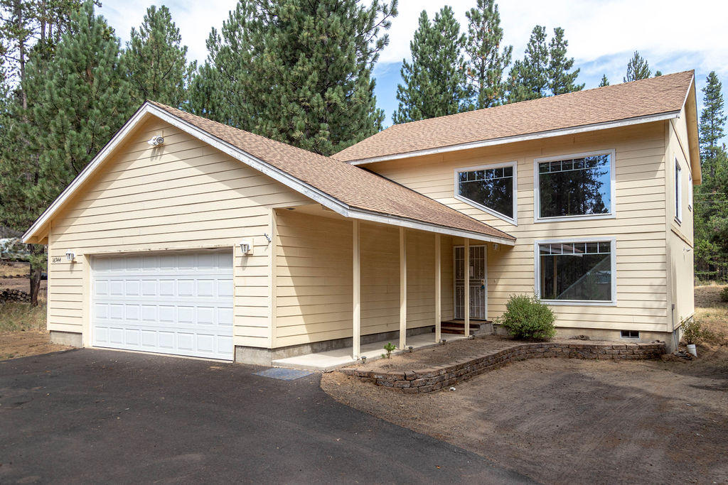 a view of a house with a garage