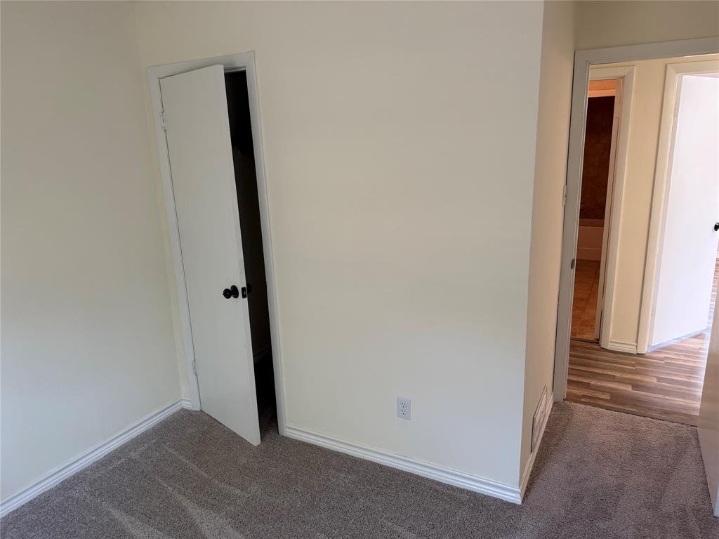 609 Crane Drive Euless, TX 76039 - Photo 12 of 15 an empty room with window