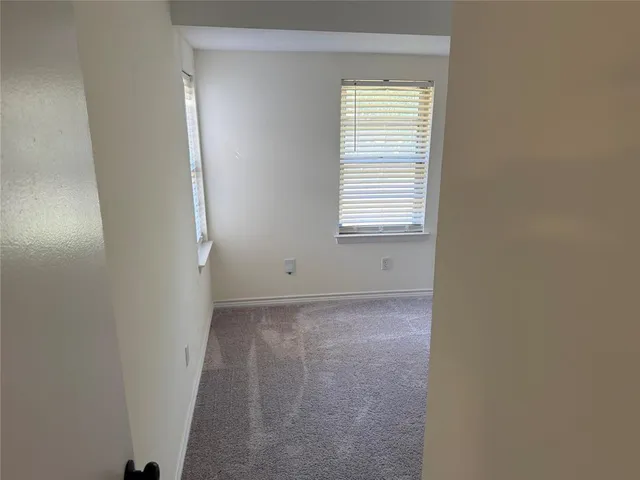 a view of a small space with a window