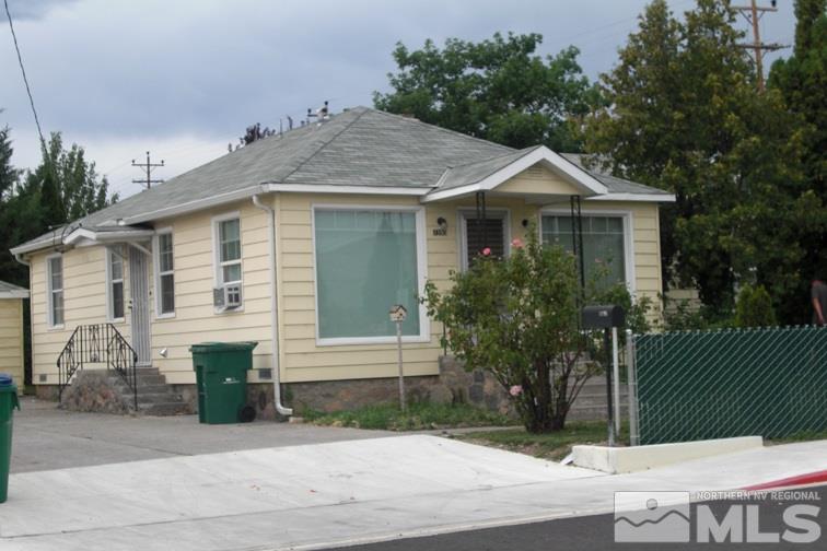 1390 Charles Drive Reno, NV 89509 - Photo 1 of 1 a front view of a house with garden