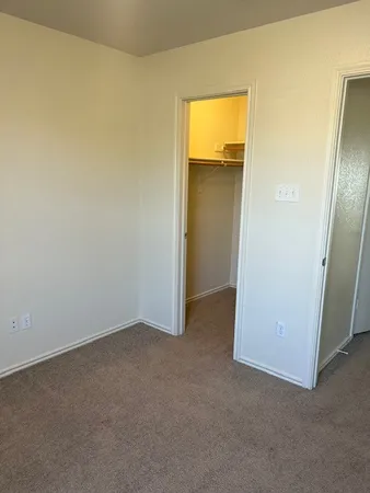 an empty room with a door
