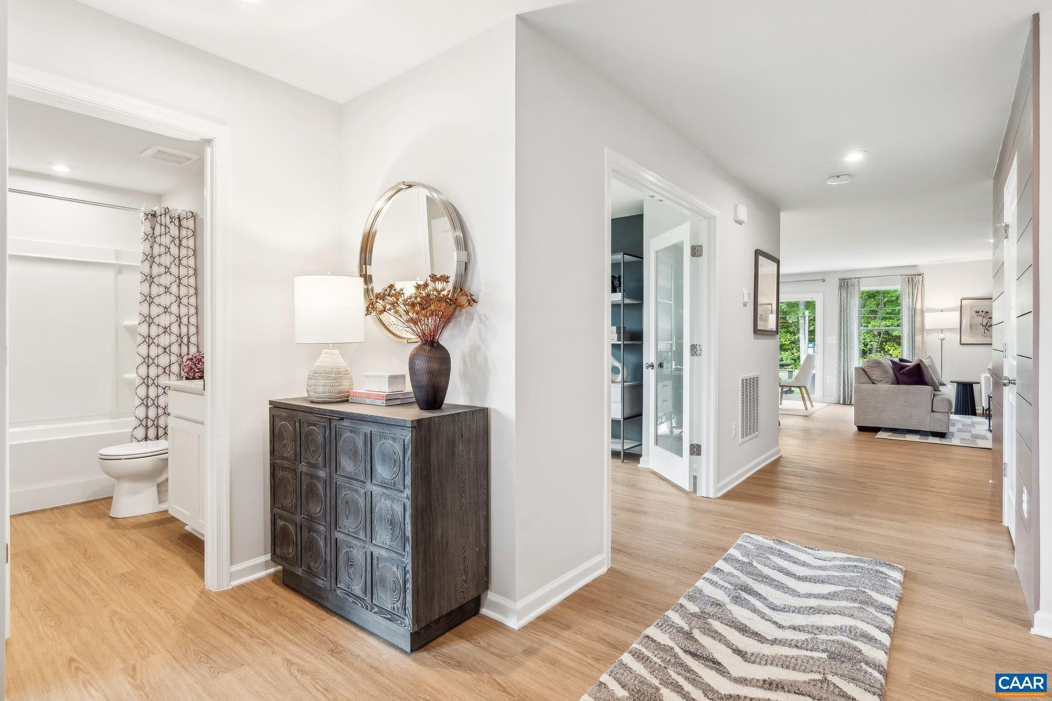 Tbd Tbd Trailfork Road Barboursville, VA 22923 - Photo 8 of 40 a living room with furniture a bathtub and a chandelier