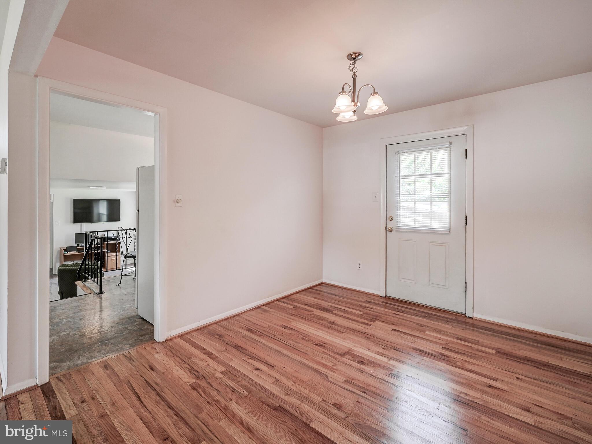 215 Highmeadow Road Reisterstown, MD 21136 - Photo 11 of 31 Dining Room w/door to deck