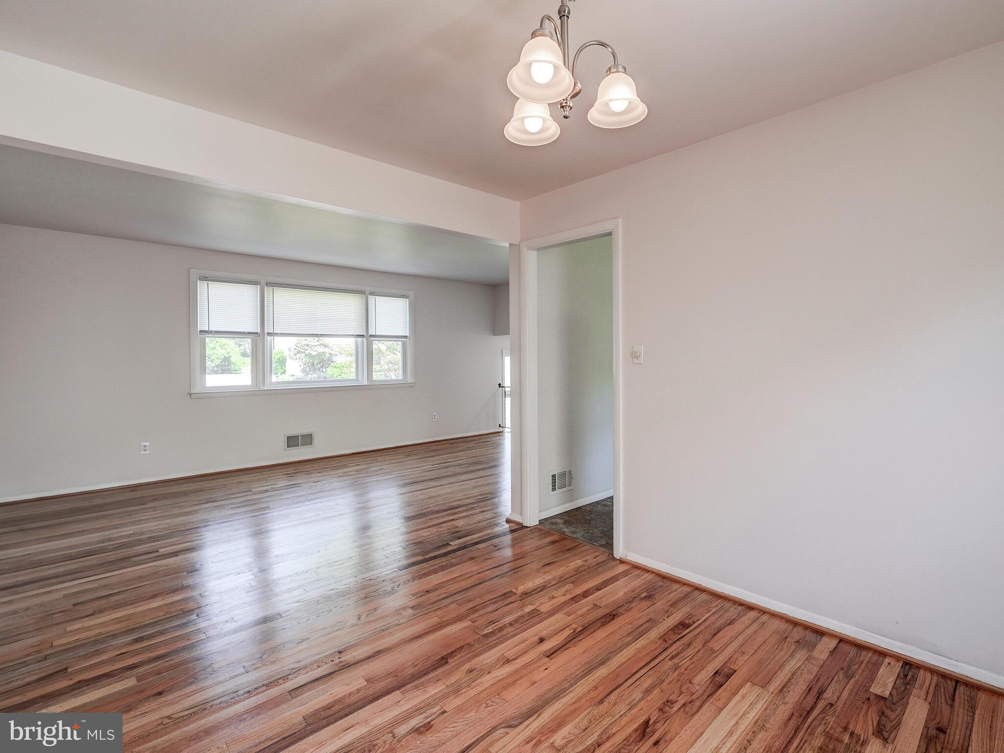 215 Highmeadow Road Reisterstown, MD 21136 - Photo 12 of 31 Living Room opens to Dining Room