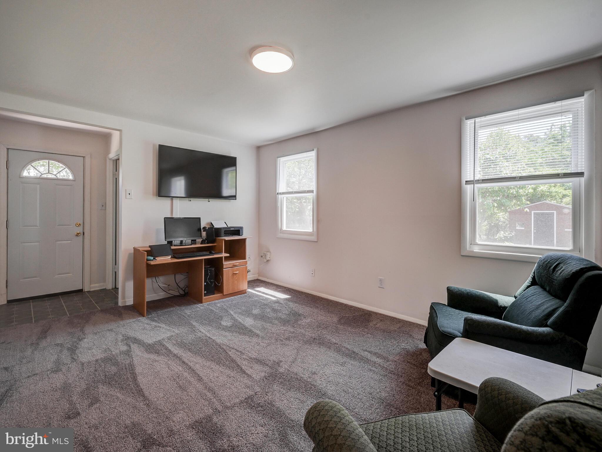 215 Highmeadow Road Reisterstown, MD 21136 - Photo 17 of 31 Family Room w/mounted TV & stand