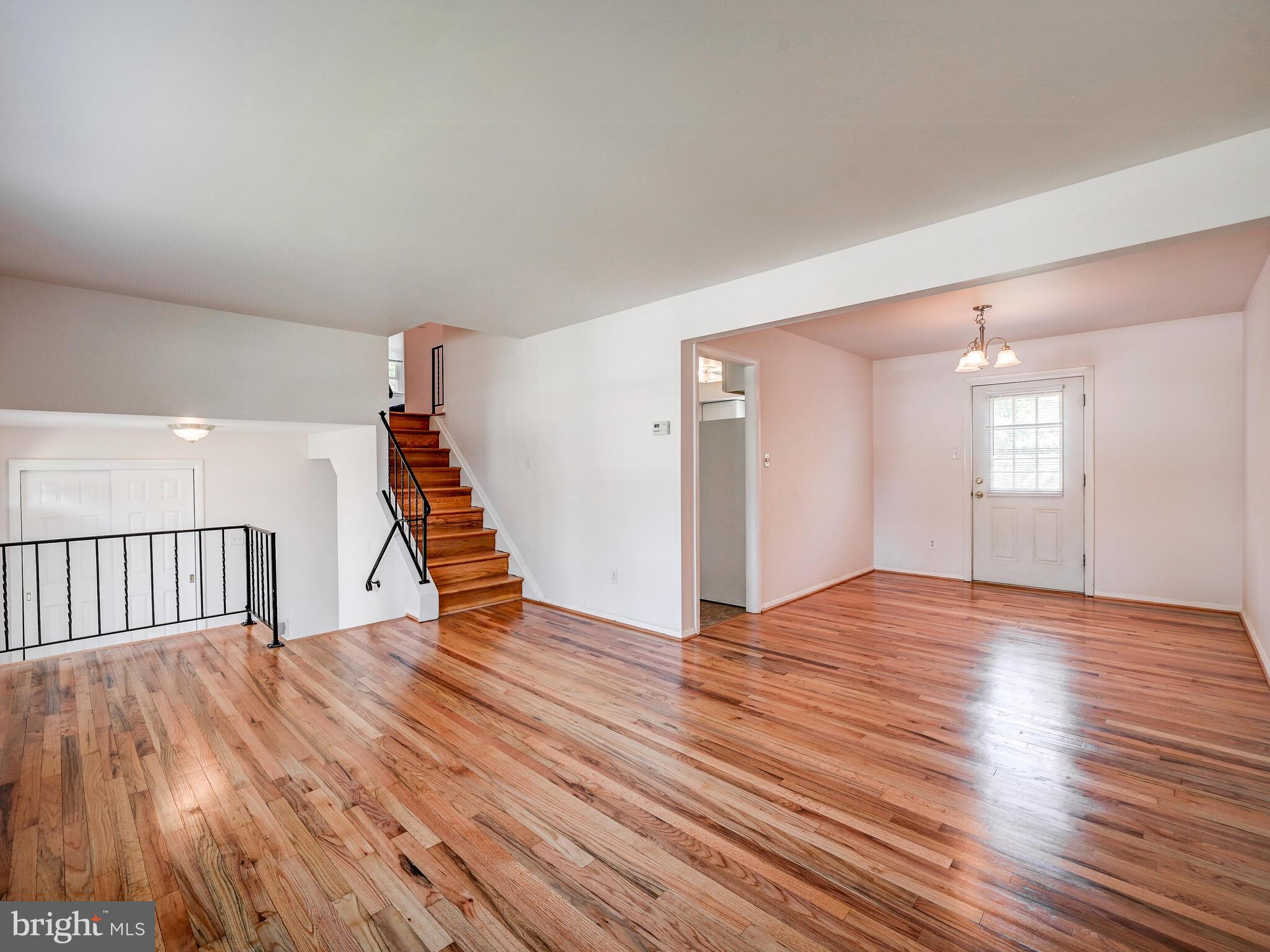 215 Highmeadow Road Reisterstown, MD 21136 - Photo 9 of 31 Living Room opens to Dining Room