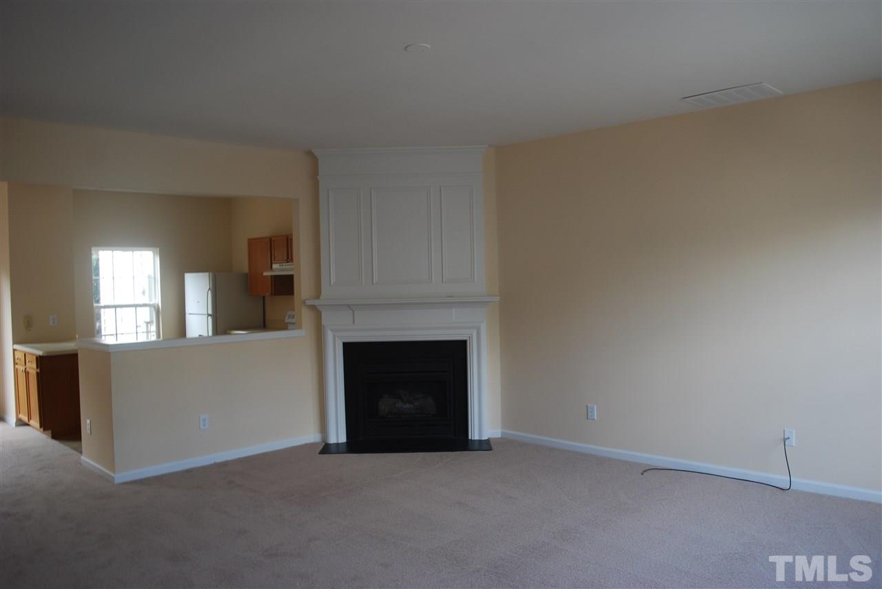 5326 Glen Canyon Road Raleigh, NC 27616 - Photo 3 of 6 a view of empty room with fireplace
