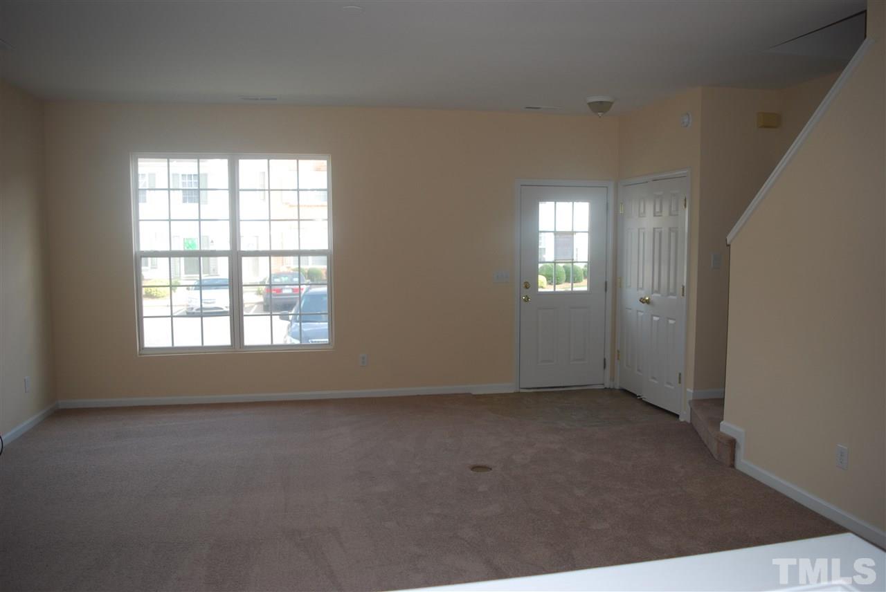 5326 Glen Canyon Road Raleigh, NC 27616 - Photo 6 of 6 an empty room with windows
