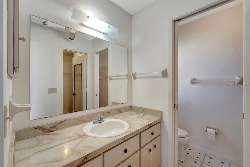 5861 Adams Road Venice, FL 34293 - Photo 37 of 51 En-Suite Bath has separate room for the toilet and walk-in shower.