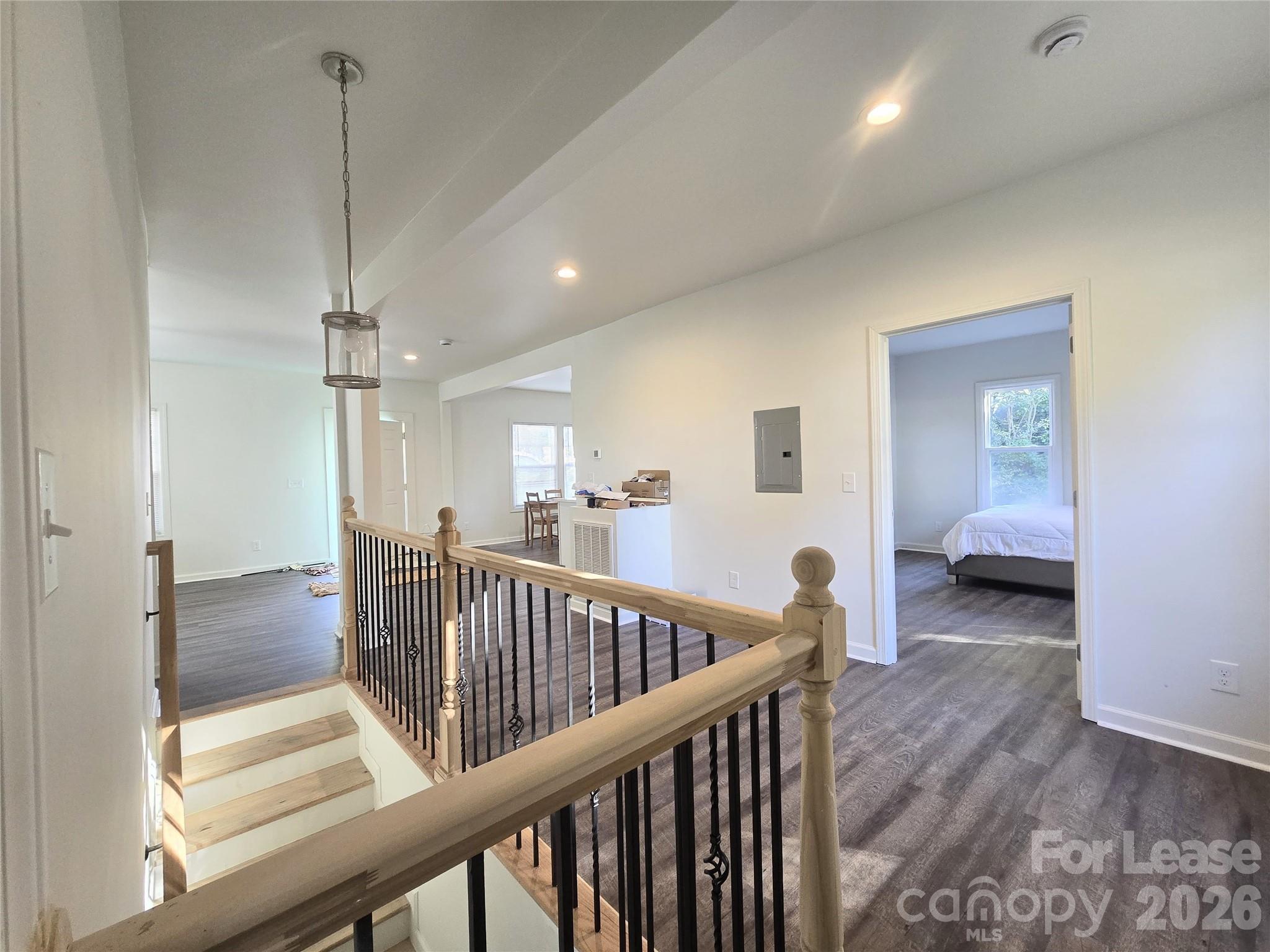 101 South Webb Street Gastonia, NC 28052 - Photo 2 of 40 a view of a hallway to a livingroom and a bathroom