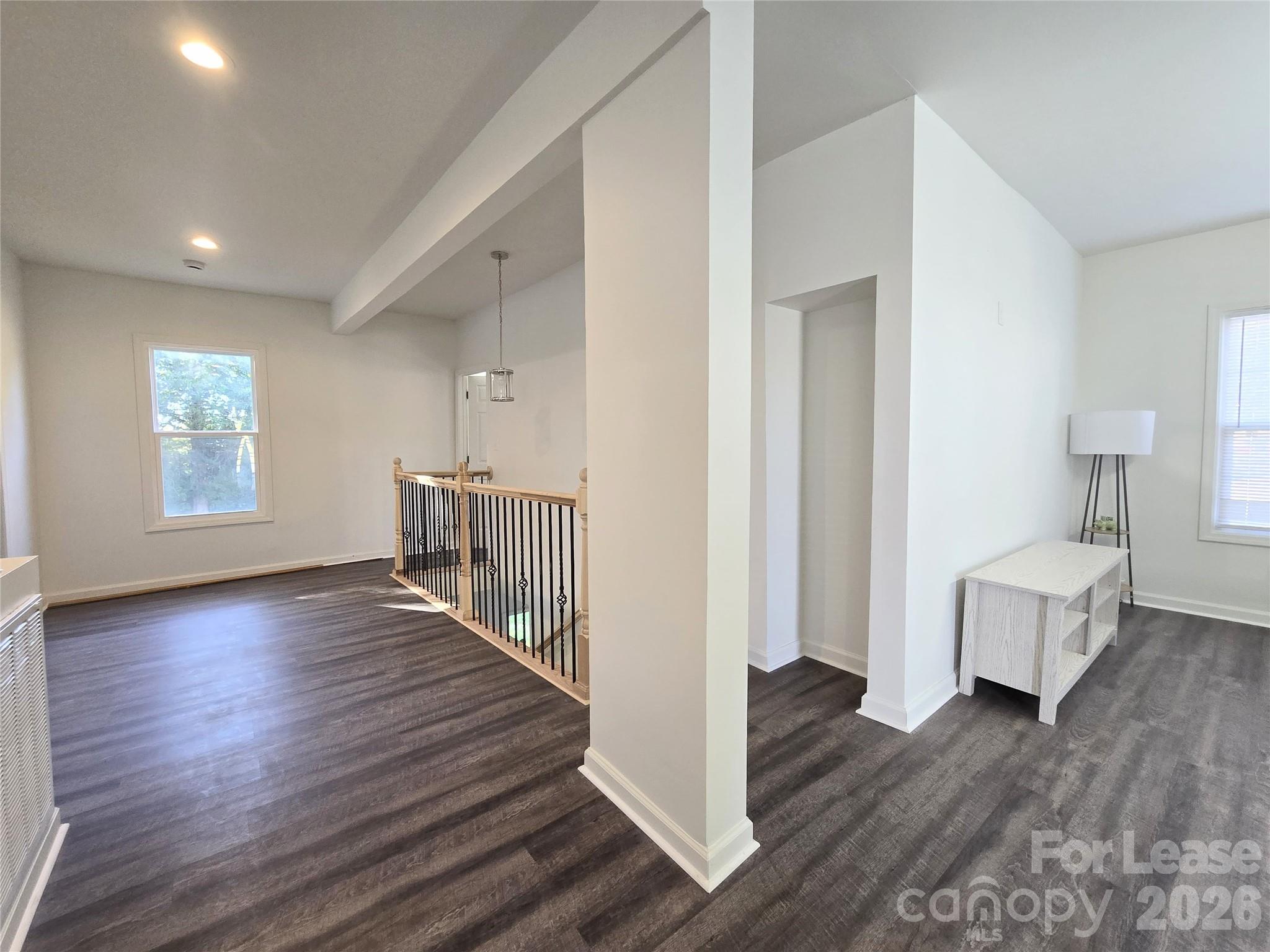 101 South Webb Street Gastonia, NC 28052 - Photo 22 of 40 a view of a room with wooden floor and window