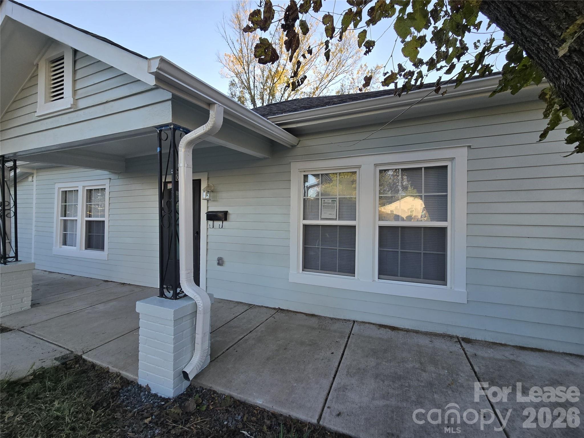 101 South Webb Street Gastonia, NC 28052 - Photo 31 of 40 a front view of a house with a yard