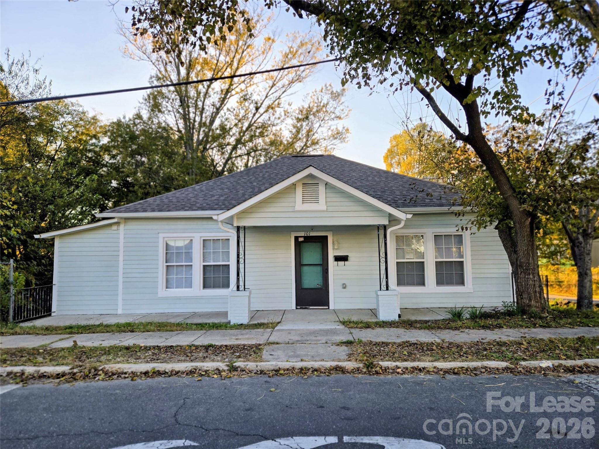 101 South Webb Street Gastonia, NC 28052 - Photo 40 of 40 a view of a house with a yard