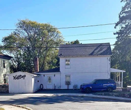 a view of a house with a garage