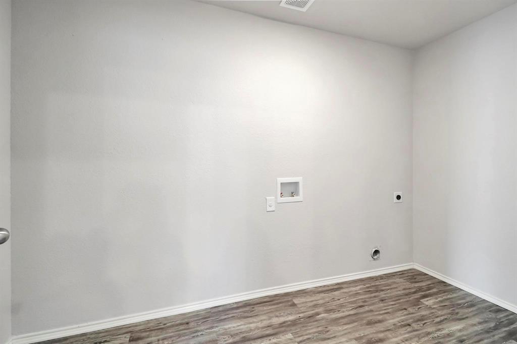 5528 Ridge View Drive Watauga, TX 76137 - Photo 16 of 16 Large utility room-- hookup for a washing machine, and hookup for an electric dryer