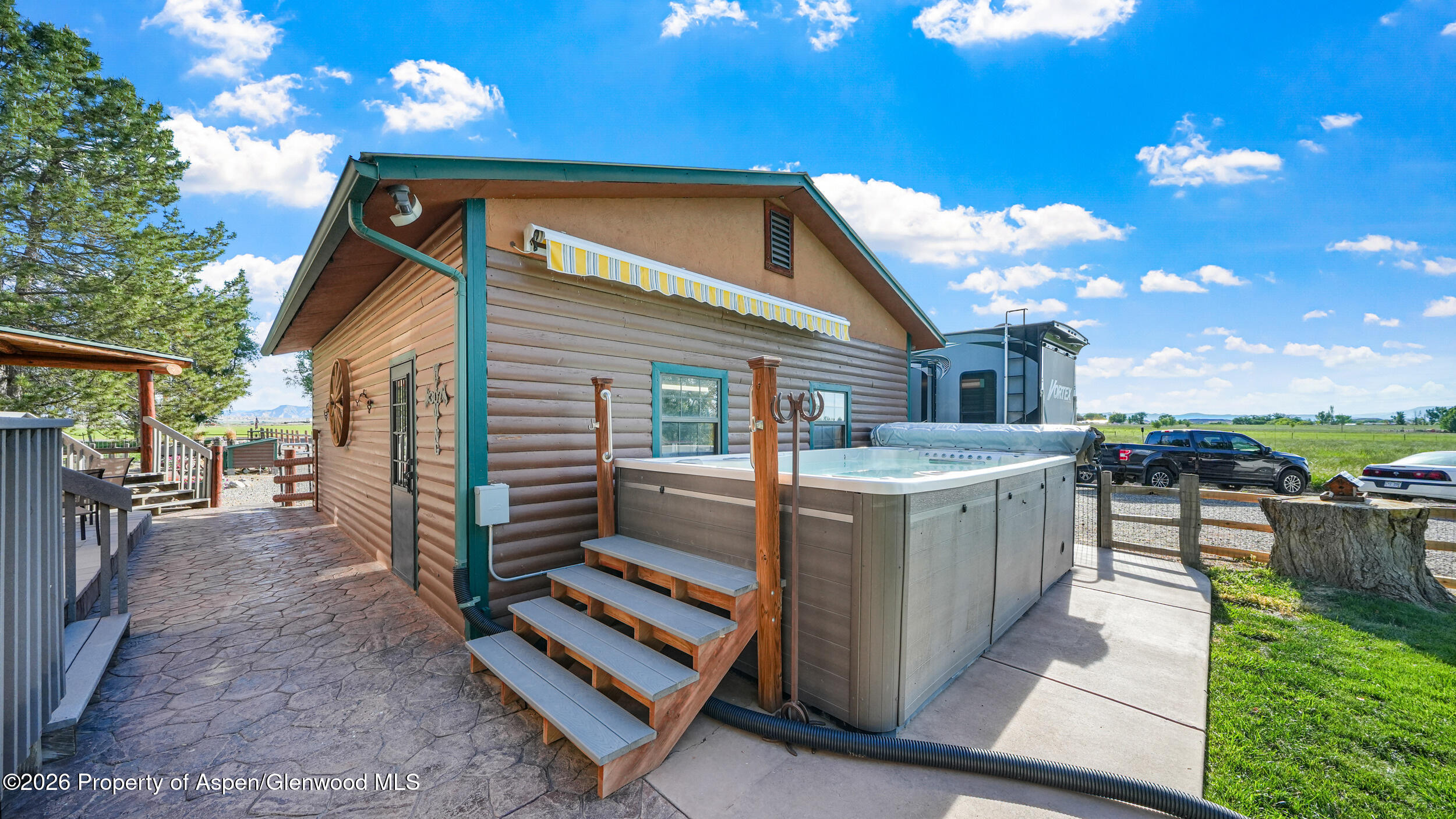1355 N Road Loma, CO 81524 - Photo 39 of 51 a view of a house with a yard