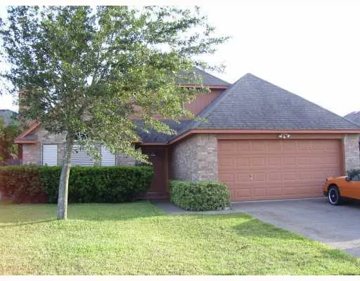 a view of a back yard of the house