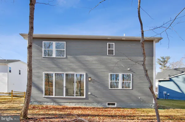 a view of outdoor space with wooden fence